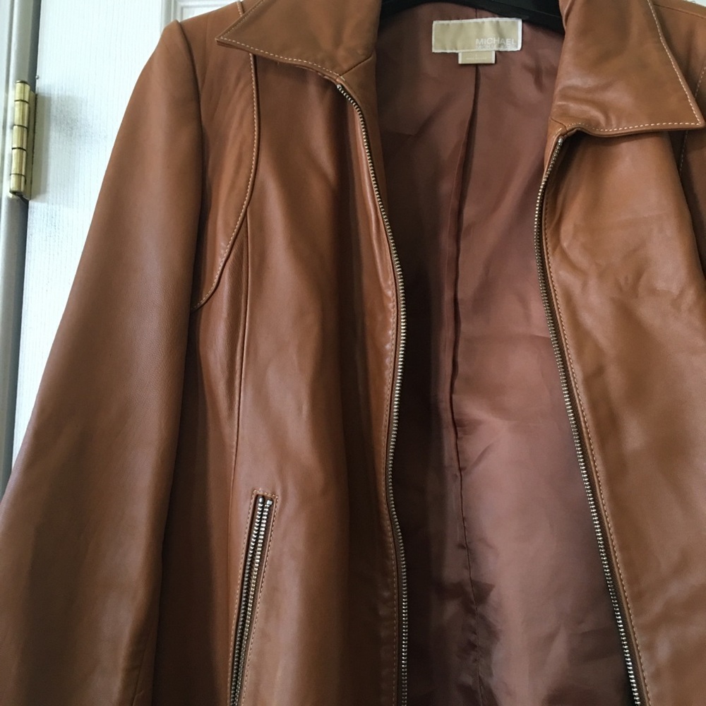 Michael Kors tan colored leather jacket.